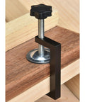 Heavy Duty Adjustable C Clamps Pack Of 8 Aluminum Alloy With Nonslip Rubber Pads For Woodworking Welding Secure Holding And Cabinet Door Alignment Perfection close-up view of a C clamp securing wood with adjustable screw.