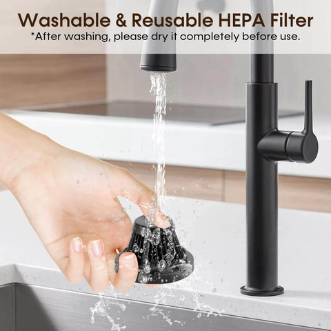 Washing a reusable HEPA filter under a kitchen faucet, demonstrating part of the Powerful Cordless Handheld Vacuum Cleaner