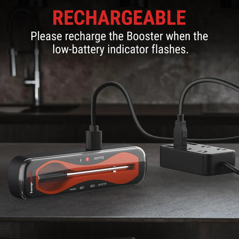 500 Ft Bluetooth Wireless Meat Thermometer that is 100 percent wire free charging with USB cable on kitchen counter