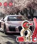 Beefy Quick Release Battery Terminal Connectors Kit M8 x 25mm in red and brass, displayed with a pink sports car.