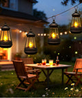 Two Pack Mini Solar Lantern Replacement Parts For Outdoor Statue Lights illuminating a garden with warm white LEDs at night.