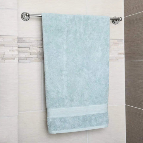 Straight Hand Towel Bar Rack In Polished Chrome, 24 Inch, Heavy-Duty Zinc Alloy Mount installed with towel in bathroom setting