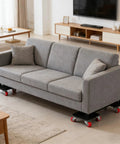Gray sofa on 360 Degree Rotating Heavy Duty Furniture Mover Dolly With Auxiliary Lifter For Sofas Beds Washing Machines And More Easy Glide Wheel System Built To Move Big Stuff Through Narrow Hallways Stairs And Tight Spaces During Home Or Warehouse Moves