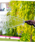 Adorable Garden Hose Repair Kit With Aluminum Alloy Fittings Ensures No Leaks So You Can Blast Your Yard Clean Without Hassle And Ditch The Old Broken Connectors For Smooth Simple Connections Today. hand holding hose repair fitting spraying water outdoors