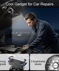 Mechanic using Magnetic Cruise Golf Cart Fan 10000mAh Portable Cooling Buddy under car hood at night