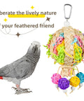 Two Pack Natural Hot Air Balloon Bird Toy Foraging And Chew With Colorful Rattan Balls For Small To Medium Parakeets Cockatiels And Conures Boredom Relief And Interactive Playtime Fun, shown beside a parrot.