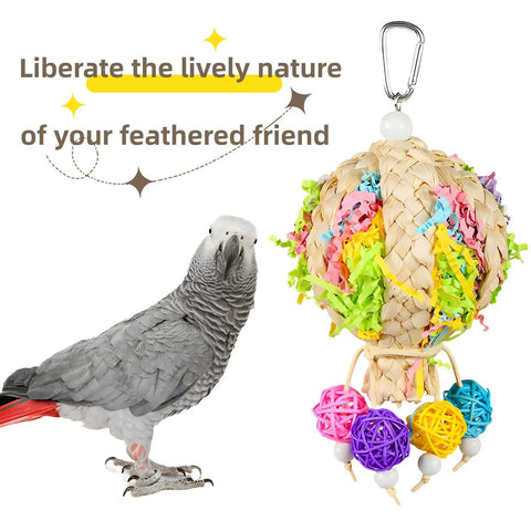 Two Pack Natural Hot Air Balloon Bird Toy Foraging And Chew With Colorful Rattan Balls For Small To Medium Parakeets Cockatiels And Conures Boredom Relief And Interactive Playtime Fun, shown beside a parrot.