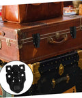 Retro Style Duckbilled Toggle Hasp Lock installed on a brown leather chest with close-up insert of black latch details