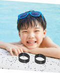 Child smiling by pool with two black rubber bands - Diving Fixing Bands 5 Pieces 1.25In Elastic Rubber Straps For Secure Backplate.