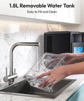 Countertop Crescent Ice Maker Slings Sixteen Chill Cubes In Twelve Minutes On Timer With Auto Flush Cycle And Adjustable Thickness For Your Weekend Kickback Shindig, 1.8L removable water tank being filled.