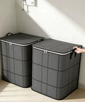 210 Liter Large Capacity Storage Bags Waterproof Dustproof Foldable Closet Organizers Heavy Duty Moving Bags With Handles and Zippers For Clothes Comforters Blankets 1 Pack, shown in a set of two, black color, with zippers and handles.