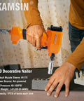 Person using Pneumatic Decorative Nailer For Upholstery Tack Gun, Air Nail Gun For Thumbtacks And Nailheads.