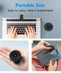 Slick 1080P USB Webcam With Crisp Stereo Mic And Slide Lock Privacy Slider For Dope Video Calls Remote Hustling Live Streaming Plug And Play Top Tier Lens Upgrade placed on a laptop with hands typing.