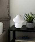 Desert Swirl Mushroom Lamp With Stepless Dimmable Glass Shade on bedside table, warm LED bulb, cozy home decor in bedroom