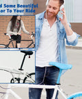 Man wearing headphones standing next to bike with blue saddle; inset shows Universal 31.8mm Bike Seat Post Clamp Quick Release Aluminum.