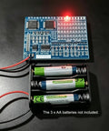 SMD SMT Components Soldering Practice Board Kit with LED water lamp demo connected to battery holder. Batteries not included.