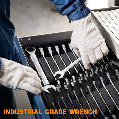 Person wearing gloves selecting a wrench from a 24 Piece Ratchet Wrench Set With 72-Tooth Ratcheting Wrenches, Metric And SAE Sizes.