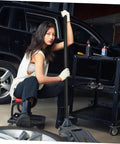 Women holding a 3 Ton Floor Jack Handle Replacement for Automotive Jacks that fits Pittsburgh floor jack parts, in a garage setting.