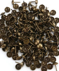 Legit Heavy Duty Antique Brass Upholstery Tacks 500 Piece Bulk Kit 7 16 Inch Dome Nailhead Trim close-up of antique brass tacks