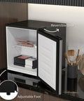 Sick Silver Mini Freezer With 1.1 Cu Ft Storage Capacity Featuring Reversible Door, adjustable foot, open with food inside.