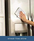 S&T INC. 50-pack white microfiber cleaning cloths; front view of hand wiping a stainless steel refrigerator.
