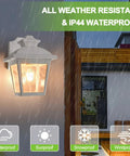 Outdoor Wall Lantern No Fuss Waterproof Porch Light For Front Door Garage And Patio With Anti Corrosion Plastic Build And Clear Acrylic Panels White Finish Bulb Included Sconce Fixture shown in rain illustrating weather resistance.