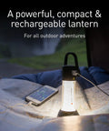 ML6 Camping Lantern With Micro Prism LED illuminating map and charging phone during outdoor adventure