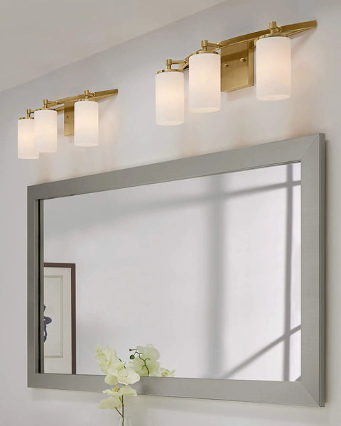 Alturas Three Light Vanity Fixture For Wall And Bath In Satin Brass Sleek 22 Inch Wide above mirror with satin etched glass