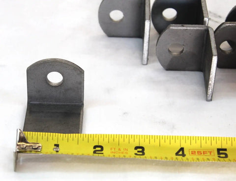Heavy Duty Weld On Steel Angle Brackets 1-1/2 In X 1-1/2 In X 1/8 In 25 Pack shown with measuring tape