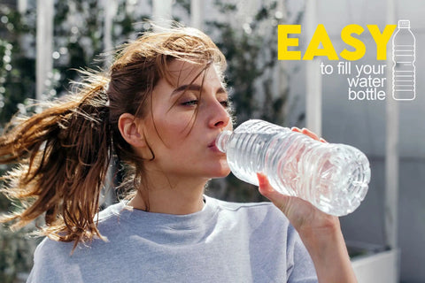 Person drinking water from a plastic bottle with text 'EASY to fill your water bottle' displayed next to them.