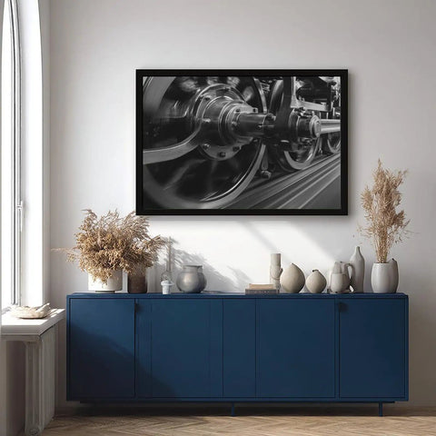 Steam Locomotive Wheels Canvas Poster Wall Art In Black And White, 24 by 36 inches, in living room setting above cabinet