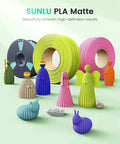 Sunlu PLA Matte filament rolls in various colors with 3D printed model figures, highlighting clean surfaces and premium design.