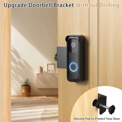 Anti Theft Doorbell Mount Bracket For Outdoor Cameras With Rain Cover, No Drill Install, shown on a wooden door indoors.