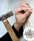 Hand using 20 Piece Drywall Anchor Kit With Self Drilling Screws And Self Tapping Fasteners for wall installation.