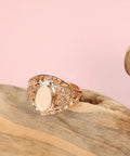 Fresh Rose Gold Oval Mesh Statement Ring For Women Featuring Sleek Polished Surface And Dope Openwork Grid Band on wood.