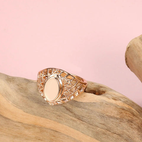 Fresh Rose Gold Oval Mesh Statement Ring For Women Featuring Sleek Polished Surface And Dope Openwork Grid Band on wood.