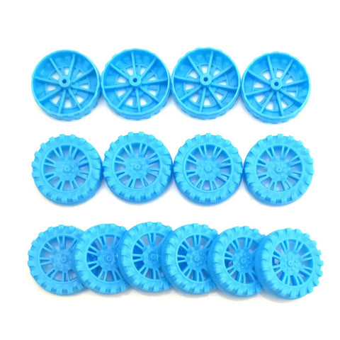 Blue plastic wheels from 300 Pcs Toy Wheels And 150 Pcs STEM Shafts For DIY RC Cars Boats And Helis Build Your Own Model Projects
