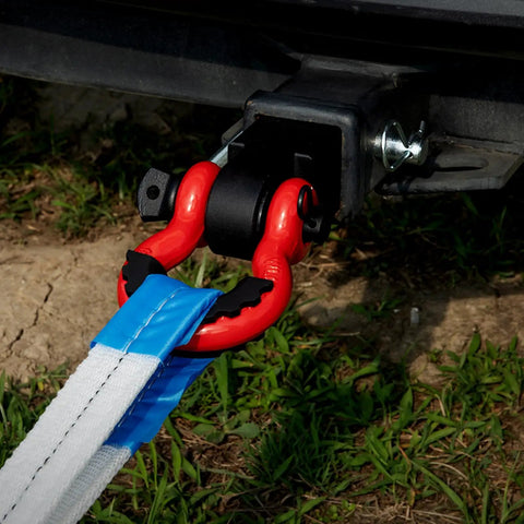 No Nonsense Heavy Duty 2 Inch Shackle Hitch Receiver Built With Grit And Rock Solid Aluminum Rated For 16000 Lbs Towing shown with D-ring and strap.
