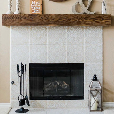 Decorative tiled fireplace with mantle, tools, and candle lantern showcasing All In One Refinishing Paint For Furniture And Cabinets No Stripping Or Sanding Needed Quick And Easy Application Bright White Quart For A Pro Look On DIY Home Makeovers.