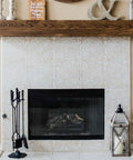 Decorative fireplace with white tiled surround and wooden mantel, featuring All-In-One Refinishing Paint For Furniture, Cabinets And More, No Stripping, Sanding, Or Priming Needed, Bright White Gallon, 3.79 Litre, Covers Up To 400 Sq Ft, D.I.Y. Friendly texture.
