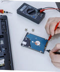 Ten Pack Hella Secure Self Tapping PC Case Screws For SSD Drive Mounting And Motherboard Hardware Featuring Knockout Stability Quick Install. A technician tests an SSD drive with multimeter tools.
