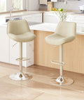 Adjustable Swivel Faux Leather Bar Stools Set Of 2, 26-34 Inch Counter Height Chairs With Footrests, Beige, in modern kitchen.