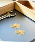 Heavy Duty Vintage Metal Toggle Latch 2 Pcs Zinc Alloy Antique Style Hasps on a workbench next to a wrench.