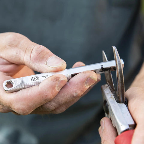 Model 905 Sharpener Carbide Stone For Pruning Shears Pro Grade Honing And Sharpening Tool in use on pruning shears