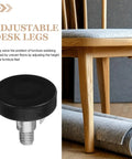 Thread Adjustable Furniture Leveling Feet For Cabinets And Tables With Metal And Plastic Construction, Height Adjustable Design For Home Or Office Setup, Versatile Screw On Levelers For Chairs Desks Tables And Cabinets. Black threaded leveling foot on chair leg for uneven floors
