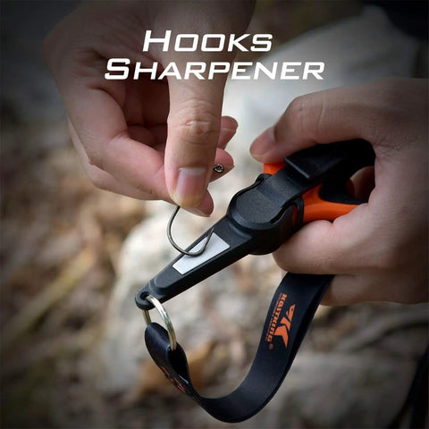Hook sharpener tool in hand, Paradox 5.5 Inch Fishing Scissors With Serrated 3CR13 Japanese 420 Stainless Blades For Braided Line Mono And Fluorocarbon In Freshwater And Saltwater No Fuss Lightweight Durable Handle For Easy On The Go Cuts