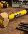 Two Pound Brass Head Sledge Hammer With Fiberglass Handle, Workhorse Impact Tool For Demolition on a wooden workbench