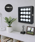 Golf Ball Display Case With 16 Slots For Wall Mount Display Clear Glass Door And Lock, shown filled and mounted on wall