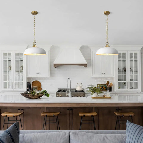 Top Shelf Matte White Farmhouse Pendant Light With Burnished Brass Accents and Super Adjustable Chain over modern kitchen island.