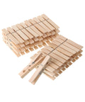 Large Wooden Clothes Pins 2.9 Inch 50 Pack Built Tough Galvanized Coil Springs stacked with one pin in focus on top.